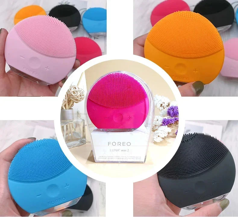 Sheluxe silicone facial cleansing brush for sensitive skin in multiple colors including pink, orange, blue, black, and red