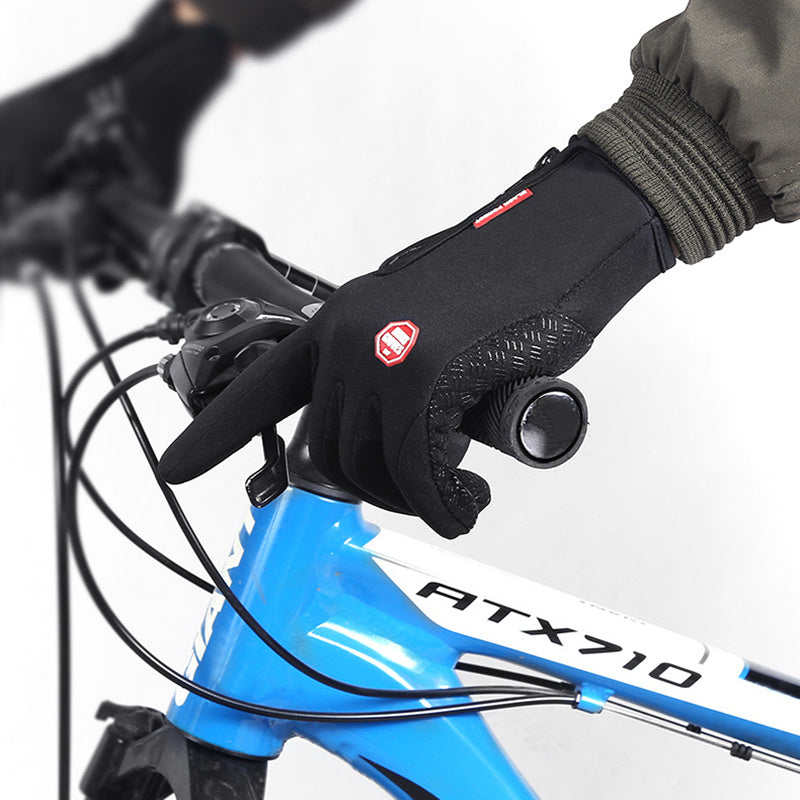 Sheluxe warm sports gloves for men and women on hand gripping blue and white bicycle handlebar