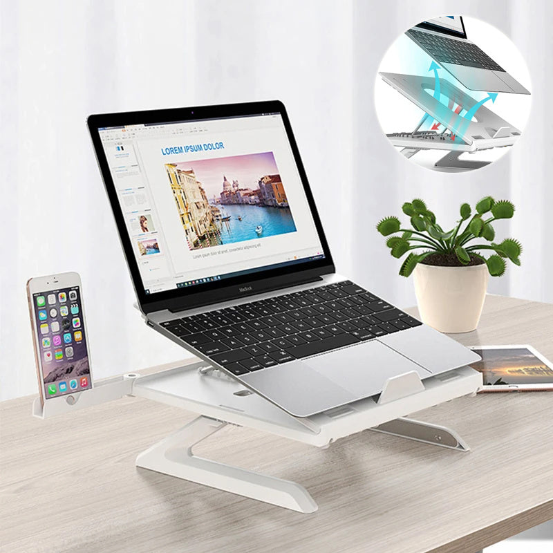 Sheluxe portable laptop stand adjustable in white with phone holder on desk next to plant