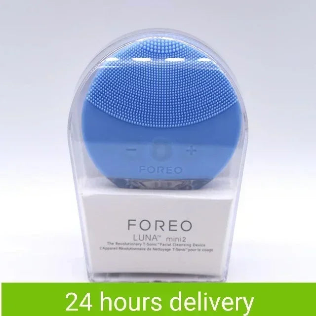 Sheluxe Foreo Luna mini 2 blue silicone facial cleansing brush for sensitive skin in clear packaging