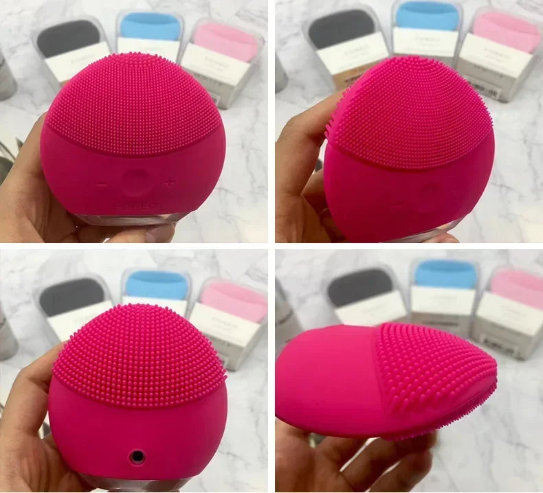 Sheluxe silicone facial cleansing brush for sensitive skin in bright pink with soft bristles and ergonomic design