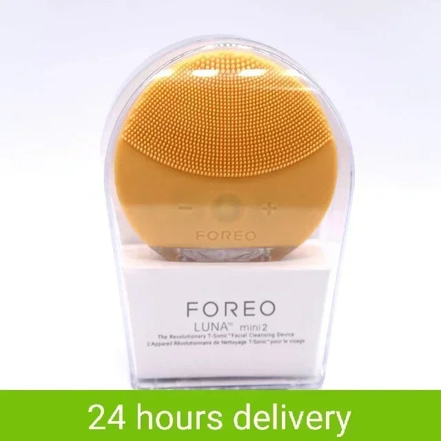 Sheluxe silicone facial cleansing brush for sensitive skin in yellow with soft silicone bristles in clear packaging