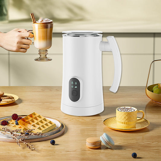 Nutritea hot and cold milk foamer in white with a digital control panel on a kitchen table