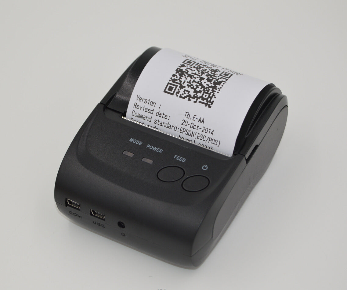 Sheluxe portable bluetooth printer in black with paper roll printing QR code and document text
