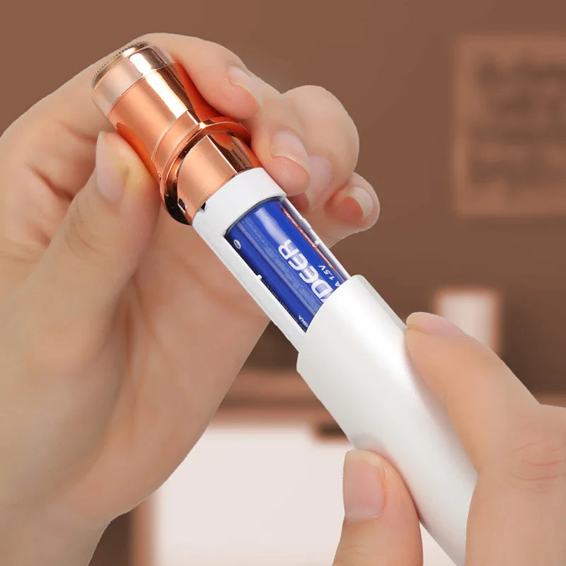Sheluxe women's electric razor for face showing battery installation in sleek white and rose gold design